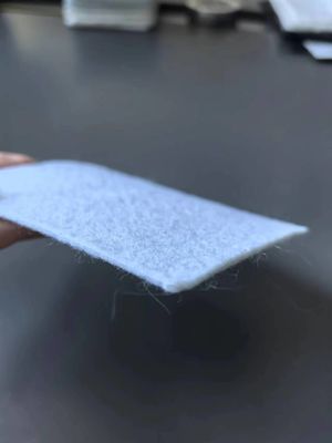 Membrana composta de dois tecidos e uma membrana utilizada em projetos de conservação da água